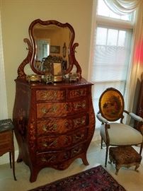 Amazing Dutch Bombe tall chest with attached mirror.  Amazingly inlaid. ...and a hand painted oval back gilt chair
