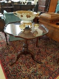 Tea table with fitted glass top, displaying Nippon punch bowl on stand and two cups