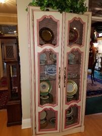 One of a pair of these cabinets, displaying sets of plates