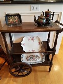 Small tea (or book?) cart with a lower book shelf now displaying the square cake plate