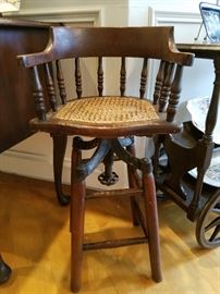 One of two similar (iron work is different).  They are swivel youth stools