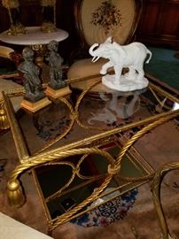 Metal table with tassel and rope motif.  Elephant is Boehm