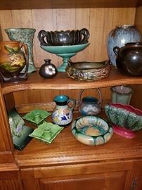 Pottery includes Roseville (repro Roseville basket on bottom shelf)