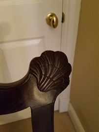 Carved shell detail to ear of chair