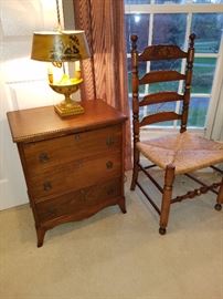 Small chest, tole lamp and ladder back chair