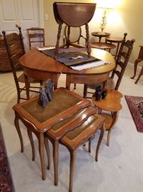 Set of 3 nesting tables. Behind: pair of demilune tables shown back to back with triple dropleaf stand on top