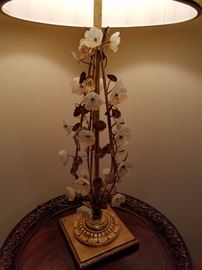 Close-up of glass flowers on the lamp.  Nice table top, too!