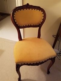Side chair with carved frame