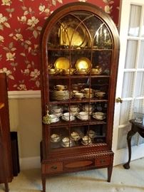 Dome top display cabinet with lower drawer and pull-out surface, by Williams Kimp (GR)