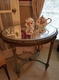 Cut glass mirror top table, green base with gilt trim appears to be the original finish.  Tea pot and Sugar bowl are Haviland