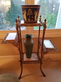 Cast metal and onyx stand.  Weller jardiniere on top has a couple hairline cracks.  Metal vase is new