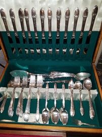 "First Love" set of regular size/style flatware for 12 with extra serving pieces (Ca. 1941)