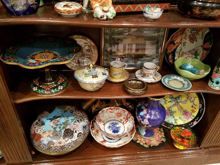 Oriental decorative items.  Lower left is a cloisonne covered box