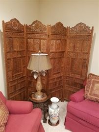 Folding screen...carved.  Lamp on Asian stand with marble inset