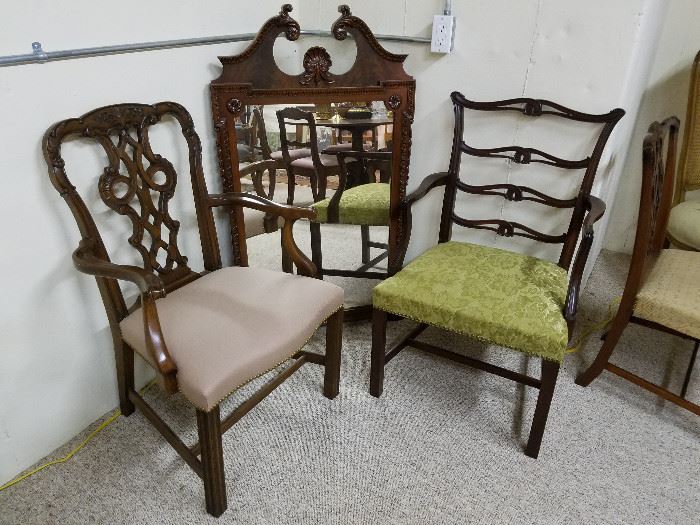 Assorted chairs and mirrors in the store room