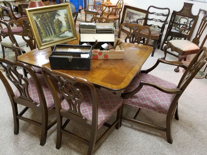 Drop-leaf table shown with set of 6 dining chairs.