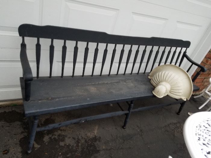 Arrow-back bench.  On it is a cast aluminum lavabo