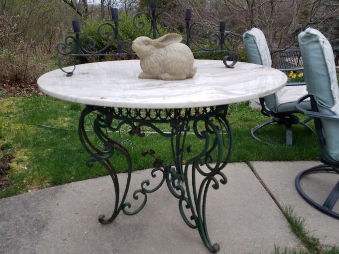 Great iron base with white marble top