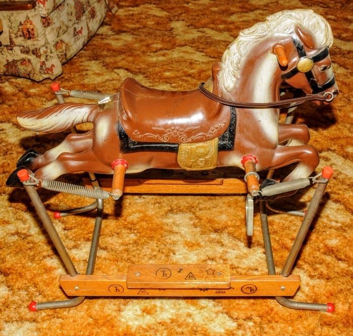 NICE SPRING ROCKING HORSE ON WOOD AND METAL BASE W/CATTLE BRANDS 