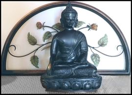 Two items: a Cast Bronze Asian Figurine of Bodhisattva plus a decorative metal floral panel in the background. Notice the lotus blossoms at the base, too.
