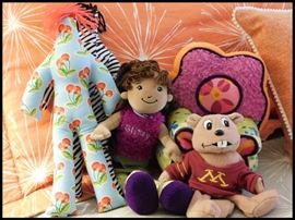 Dammit dolls, Glitzy doll with chair, U of M plush plus pillows.