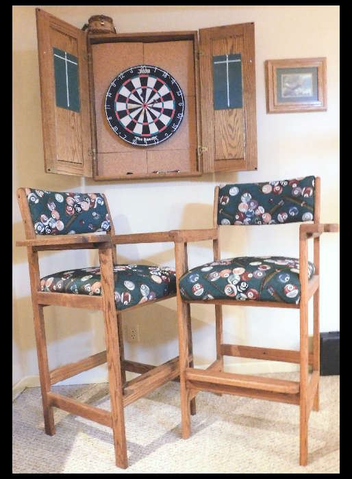 Pool Balls designed upholstered high chairs and dart board.