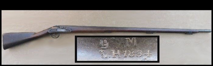 19th century muzzle loader wall hanger.