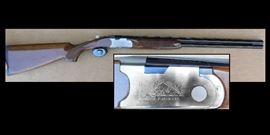 Beretta 20 Ga. overunder with 26 inch barrel and choke tubes.