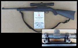 Rueger 22 semi-automatic with extra magazine, Simmons scope and case.