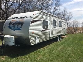 2012  27 foot Grey Wolf Cherokee travel trailer         Sleeps seven. Shower, microwave, fridge, oven, heater, air conditioner, TV, entertainment center.  Has been pulled less than 250 miles!  New battery, current tabs. 3 point hitch. Ready for summer fun!