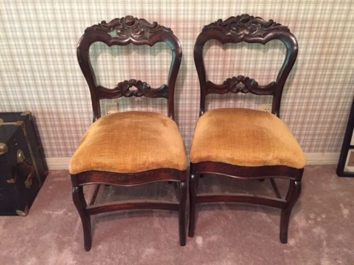 pair of ornate rosewood carved back chairs