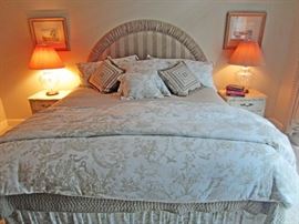 One of two king beds, superior linens, cut glass lamps, country French style night stands