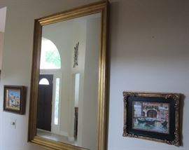 Large gilt frame mirror and two small Italian canal scene oil paintings