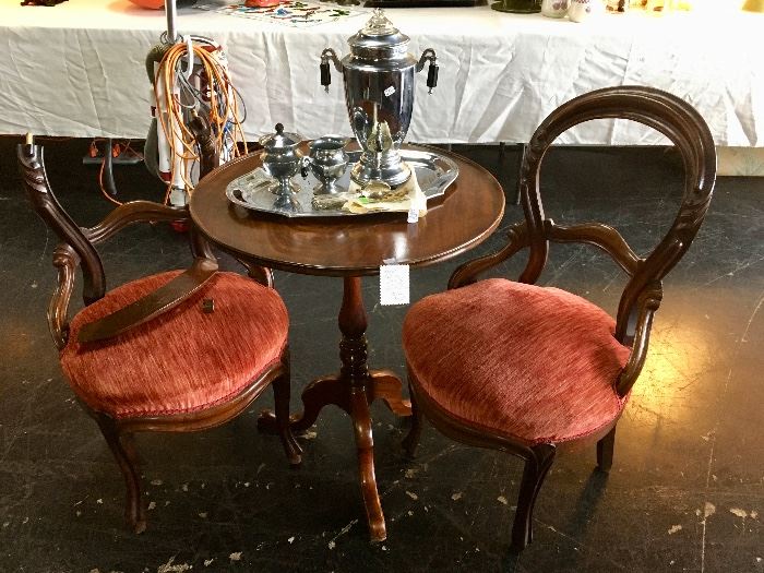 Two antique upholstered parlor-style chairs (one needs to be repaired), and a vintage coffee pot with creamer and sugar