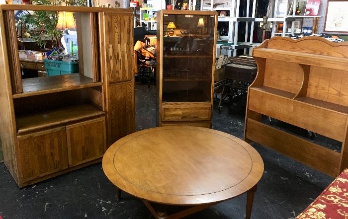BEAUTIFUL round mid-century modern coffee table and the entire table turns like a lazy-suzan. Oak Twin headboard, and a 2-piece oak entertainment center