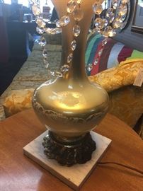 Closer look at the base of this gold vintage lamp
