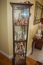 Metal and glass curio cabinet
