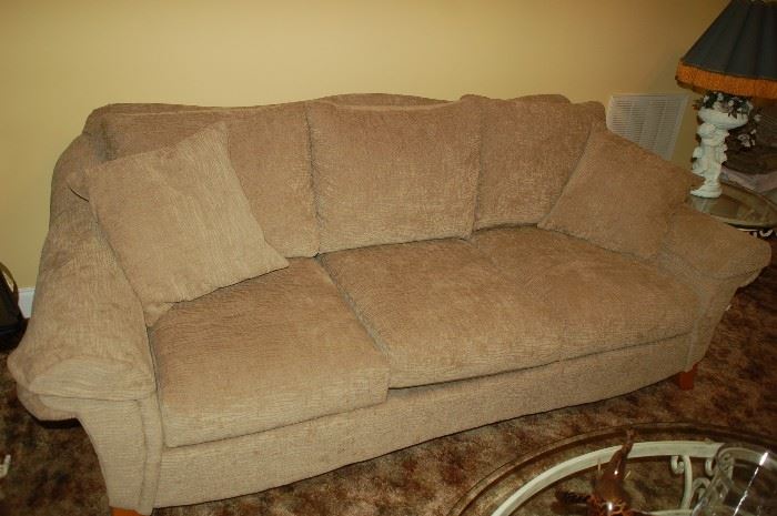 American  Home Collection tan couch
