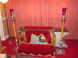 Vintage prayer rails and kneelers.  Electric casket, candle stands.