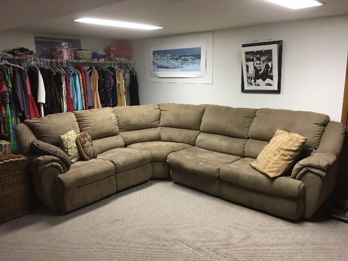 One of two sectional sofas for sale. This one is mocha microfibre sleeper sofa with a double pull-out bed.