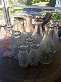 Selection of milk bottles - pasteurized and unpasteurized