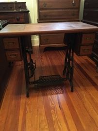 Antique sewing machine table made into a unique table