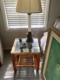 Rattan side table one of a pair