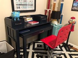 Black Desk and Red Chair