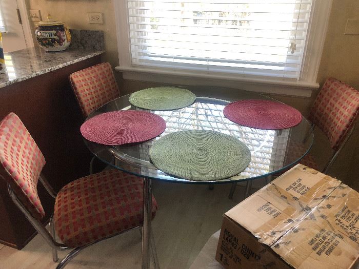 Vintage Glass and Chrome table with 4 chairs