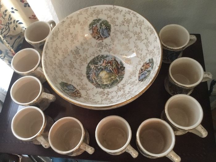 Serving bowl with 10 matching cups.