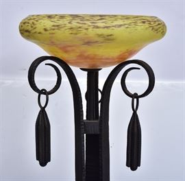Art Deco Style Wrought Iron Torchiere Lamp
Description	
63 1/4" tall, with mottled glass
13" diameter shade, signed 'Daum'
