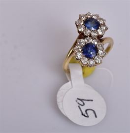 14k Gold Sapphire and Diamond Ring
each sapphire surrounded by 10 diamonds
ring size 6 3/4, 3.5 dwt gross