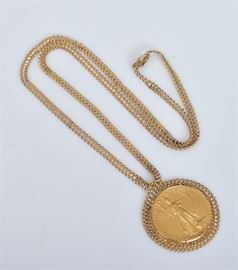 1 Ounce $50 Gold American Eagle Coin
1986, set on a 14k gold chain, 23" long
35.6 dwt