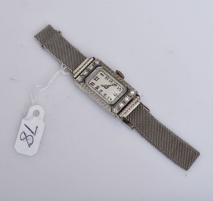 Platinum and Diamond Ladies Wrist Watch
1" diameter face with a 14k gold
mesh bracelet, 14.2 dwt gross